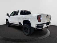 Welcome to Capital GMC! *This 2026 GMC Sierra AT4 2500HD Capital Custom Lifted Truck in Summit White... (image 2)