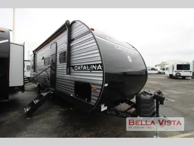 Coachmen Catalina Legacy Edition travel trailer 293QBCK highlights: Private Bunkhouse U-Shaped Dinet...