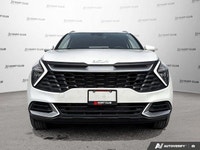 Experience the practicality and reliability of a 2023 Kia Sportage LX, boasting a sleek white exteri... (image 9)