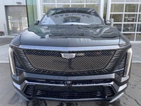 The 2026 Cadillac Vistiq 1SH, finished in elegant Stellar Black Metallic with a Jet Black interior,... (image 1)
