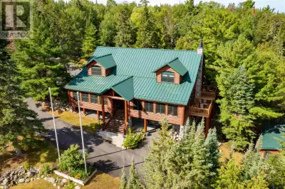 New Listing. Spectacular Whitefish Bay vacation compound! Built in the great lodge tradition of Mont...