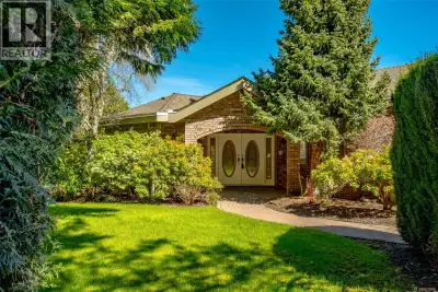 Set on a 5 acre ocean view lot just minutes north of Nanaimo, this well built 4973sf level entry hom...
