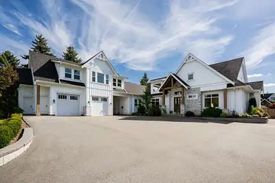 Custom 6-bedroom, 4-bathroom home offering 5,400 sq ft of living space on a sprawling 24,000 sq ft l...