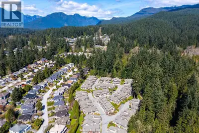 A Private Forest Retreat in a Gated Community | North Shore Living at Its Finest Tucked away at the...