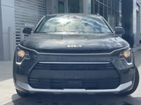 AMVIC Licensed Dealer The 2025 Kia Niro EX FWD, finished in Interstellar Grey, is a smart and effici... (image 1)