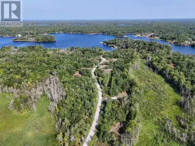 Set on almost 49 acres in the Honey Harbour area of Georgian Bay, this rare offering includes four s...