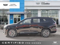 The 2025 Cadillac XT6 AWD Sport, dressed in a sophisticated Stellar Black Metallic exterior and a lu... (image 2)