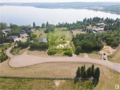 Spectacular lakefront lot with breath taking views of Moose Lake. Perfect place to build your dream...