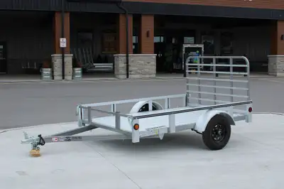 2025 Homestead Hauler 5x8 Open Rail Utility Trailer SPECIFICATIONS G.V.W.: 1,980 lbs. Payload: 1,600...
