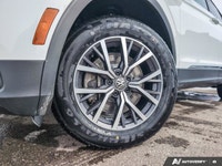 The pre-owned 2021 Volkswagen Tiguan Comfortline is a versatile and well-equipped SUV designed for d... (image 6)