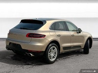 The 2015 Porsche Macan comes equipped with all-wheel drive, heated leather seats, a heated steering... (image 4)