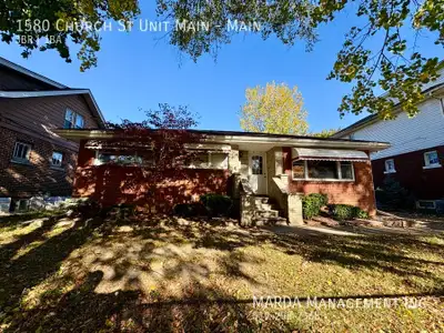Welcome to 1580 Church, a delightful main floor unit featuring beautiful hardwood flooring and abund...