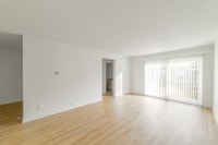 Amenities: Playground • In-suite Laundry • Outside Green Space Suite & Building: Spacious two-bedroo... (image 1)