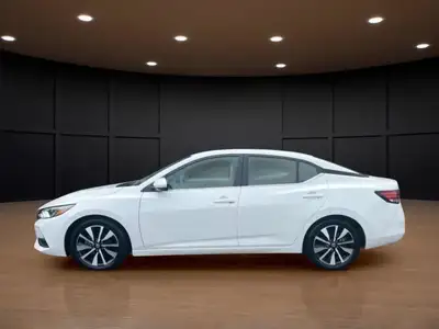 The 2023 Nissan Sentra SV CVT in pristine White is a front-wheel-drive sedan that handles beautifull...