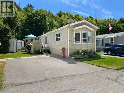 Welcome to easy living in Shuswap Sands Mobile Home Park! This well maintained 2008 manufactured hom...