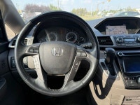 2014 Honda Odyssey Touring — White exterior, Brown interior. This Odyssey is powered by a 3.5L V6 th... (image 8)