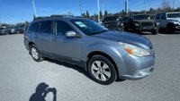 The 2011 Subaru Outback is a versatile wagon-style SUV that's built to handle all kinds of driving c... (image 1)