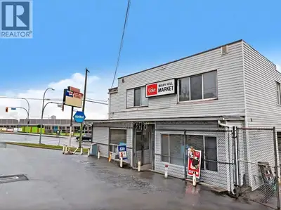Discover this exceptional mixed-use commercial and residential property in the heart of Port Coquitl...