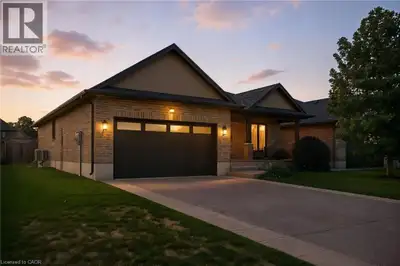 Welcome to this beautifully maintained 2+1 bedroom, 2 bathroom brick bungalow in Delhi, Ontario — of...