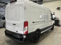 Le Ford Transit 2019 version T-250 toit moyen 148 po PNBV de 9 000 lb porte coulissante côté passage... (image 3)