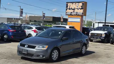 TIGER AUTO SALES LTD - Quality Pre-Owned Car Dealership - Located at 2275 Dundas St., London, Ontari...
