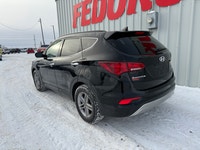This well above average condition Hyundai Santa Fe Sport AWD includes a 2.4L L4, heated leather seat... (image 1)