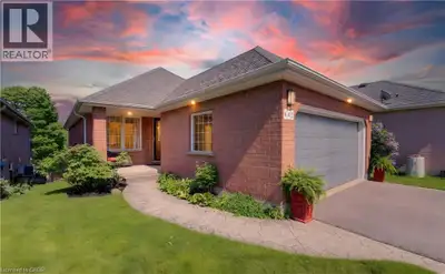 Beautiful bungalow with walkout basement in sought-after Conservation Meadows, backing onto tranquil...