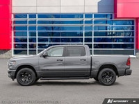 This Ram 1500 has a dependable Gas/Electric V-6 3.6 L/220 engine powering this Automatic transmissio... (image 3)