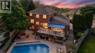 Welcome to Paradise on the Grand. Prepare to be captivated by this luxurious, fully finished 4 bedro...