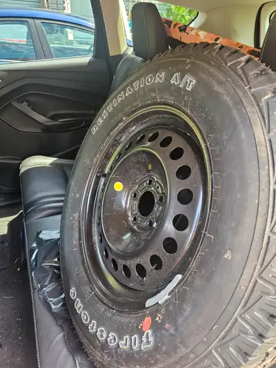 Brand new tire and 5 bolt rim Was a spare tire for my jeep Cherokee Tires were upgraded and i know l...