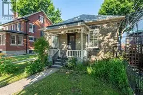 MONEY MAKER, Stunningly renovated Regency-style cottage built in 1890, one of Sarnia's most cherishe...
