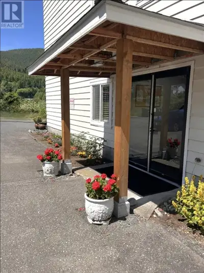 Bright, refreshed, and ready to go! This top-floor corner unit is flooded with sunlight and showcase...