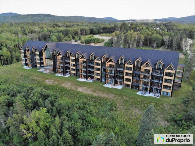 $705,500 - Condominium for sale in Baie-St-Paul — photo 1