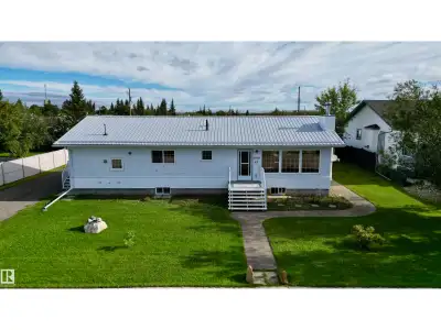 Set on two lots in the Village of Chipman, this bungalow offers generous living space on both levels...