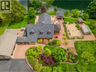 Nestled in the tranquil beauty of Shoreacres, BC, this custom-built log home epitomizes waterfront l...