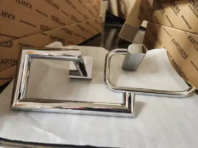 Assorted kartners toilet paper holders. Brushed nickel, chrome, and matte black. The last 2 pictures...