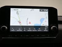 The Outlander is praised for its generous cargo room, smooth ride, and generally good fuel efficienc... (image 7)