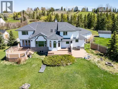 Come and experience the beauty of country living where sophistication meets serenity—just 30 minutes...