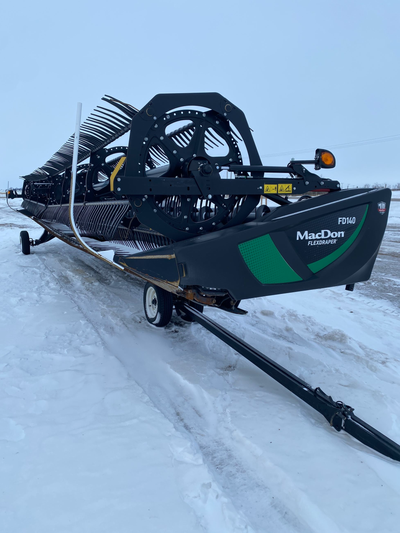John Deere adpater. 40 foot width. Contour Buddies. Double knife drive. Pea auger. For more informat...