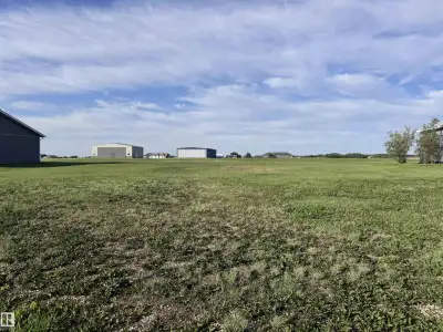 Dreaming of building a hangar for your wings?? This is the nicest, best located lot at Westlock airp...