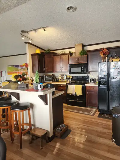 I am offering a clean furnished room in my house. You would share large kitchen and laundry. Deck Bb...