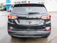 Experience the dynamic drive of the 2022 Chevrolet Equinox AWD RS in a striking black shade with adv... (image 3)