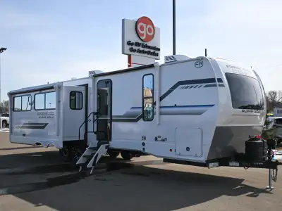 The 2026 Forest River Cherokee Alpha Wolf 26RL is designed as a comfortable rear-living travel trail...