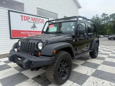 A rugged four-door SUV with iconic styling, manual transmission, and strong 4x4 capability, offering...