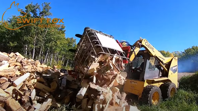 Box rotator. Rotating pallet forks for dumping out boxes of potatoes, firewood, etc. 180 degree rota...