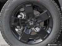 Introducing the 2026 Honda Ridgeline Black Edition AWD, a stunning red truck designed for those who... (image 6)