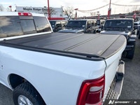 Command attention with this remarkable 2023 Ram 3500 Laramie Crew Cab, a freshly acquired trade-in t... (image 8)
