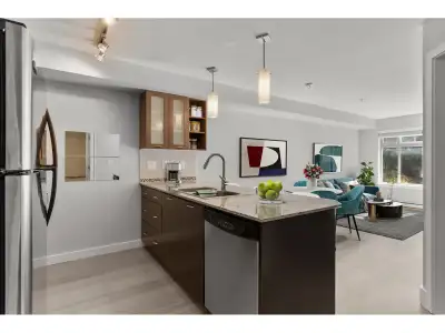 Welcome to a bright, quiet one bedroom plus den condo at The Latitude. Featuring granite countertops...