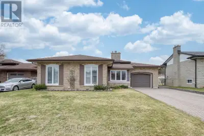 Step into a home where pride of ownership truly shines! This incredible backsplit has been impeccabl...