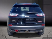 Le Jeep Cherokee Trailhawk 2021 est un SUV conçu pour les amateurs d'aventure et de conduite hors ro... (image 5)